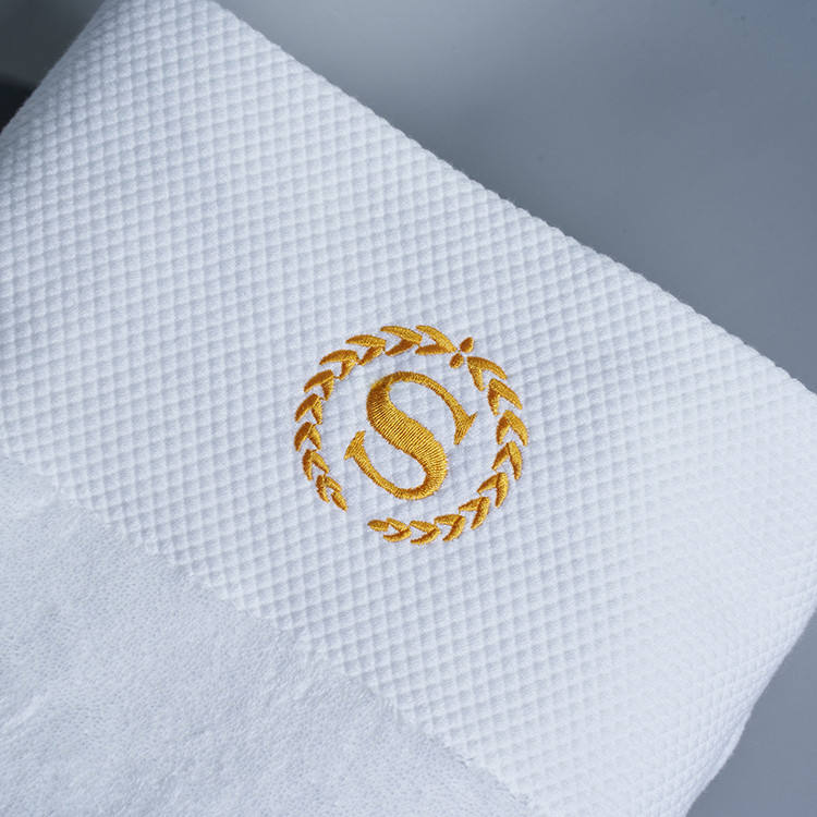 Broderie logo linge hôtelier Maroc